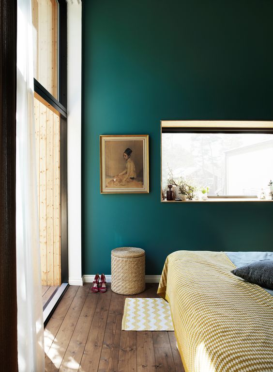 Parete camera da letto colore ottanio