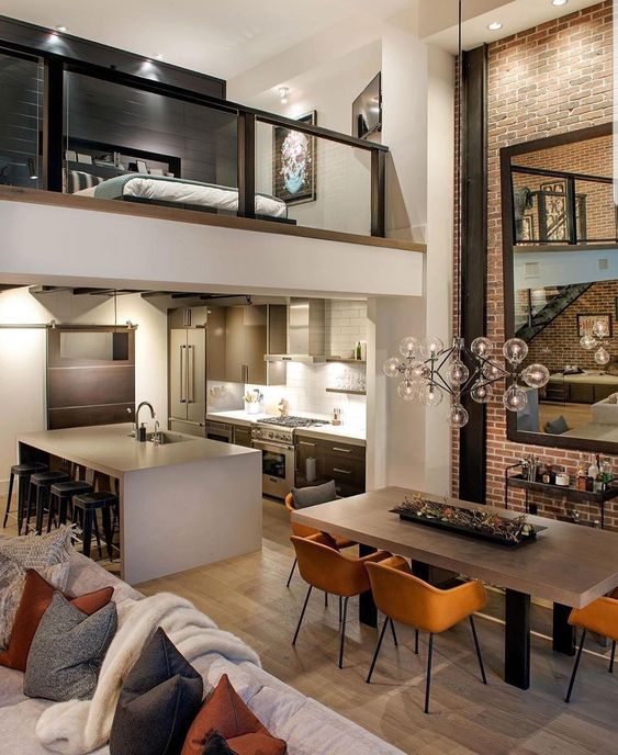 casa con divano e cucina uniti