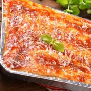 lasana con salsa de pescado