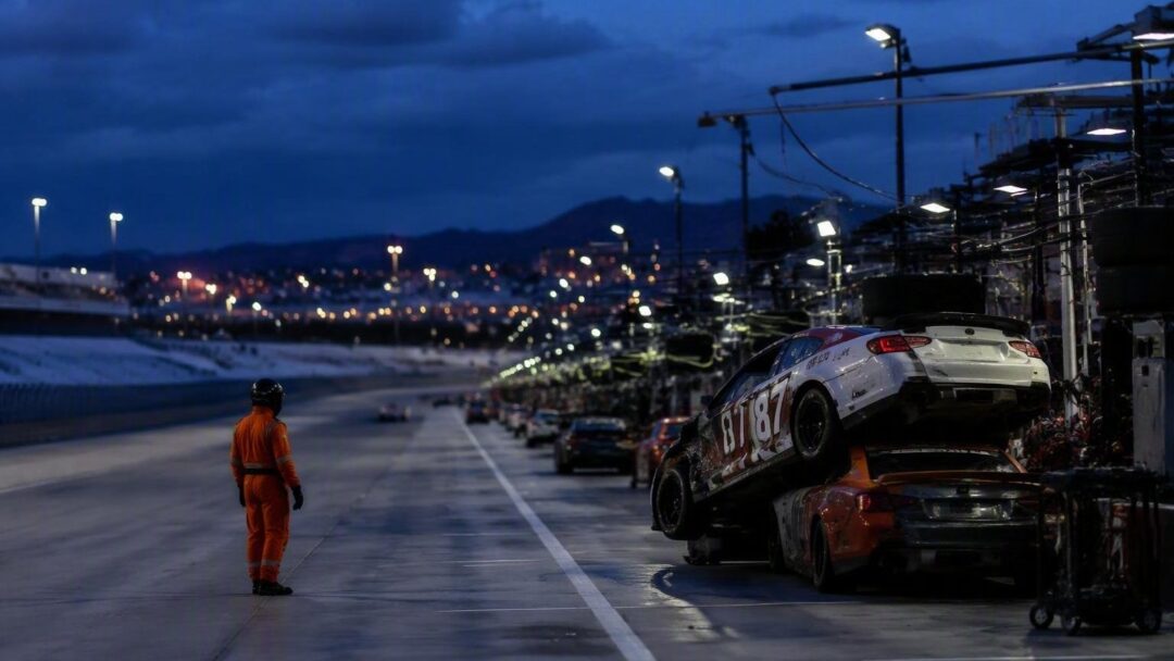 Joe Gibbs Racing tire changer survives Gateway pile-up and gets damaged car panel as gift