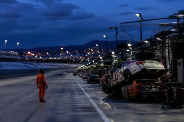 Joe Gibbs Racing tire changer survives Gateway pile-up and gets damaged car panel as gift