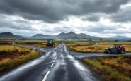 Collision between car and tractor causing traffic delays