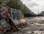Macron rejects minister’s resignation as police overwhelmed by French protests