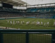 South Florida high school football players engage with Miami dolphins at Hard Rock Stadium