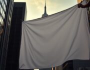 Empire State Building climbers unfurl peace banner and propose at 1,454 feet