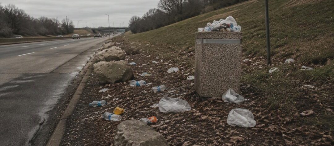 Local volunteers fight growing trash problem on I-490 and city sidewalks