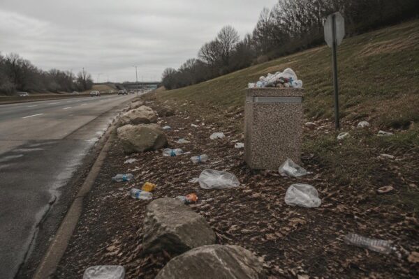 Local volunteers fight growing trash problem on I-490 and city sidewalks
