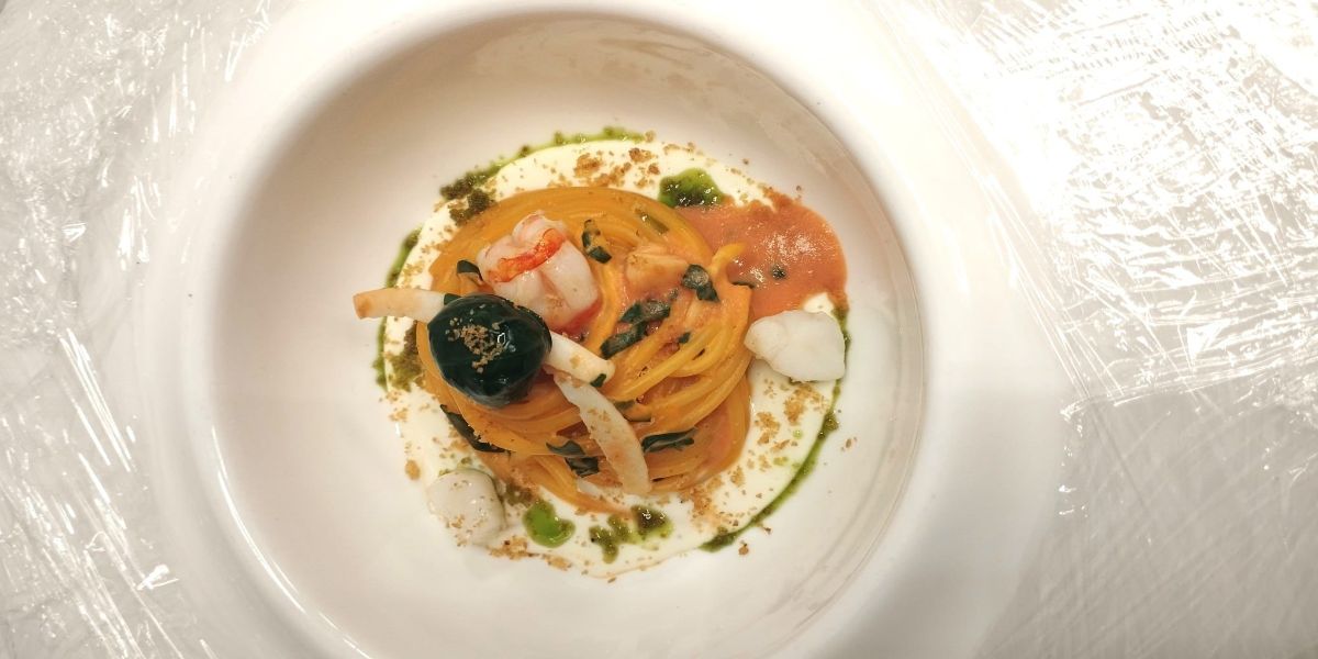 di terra e di mare spaghetto con fumetto ristretto 2 fotor 20250224154921