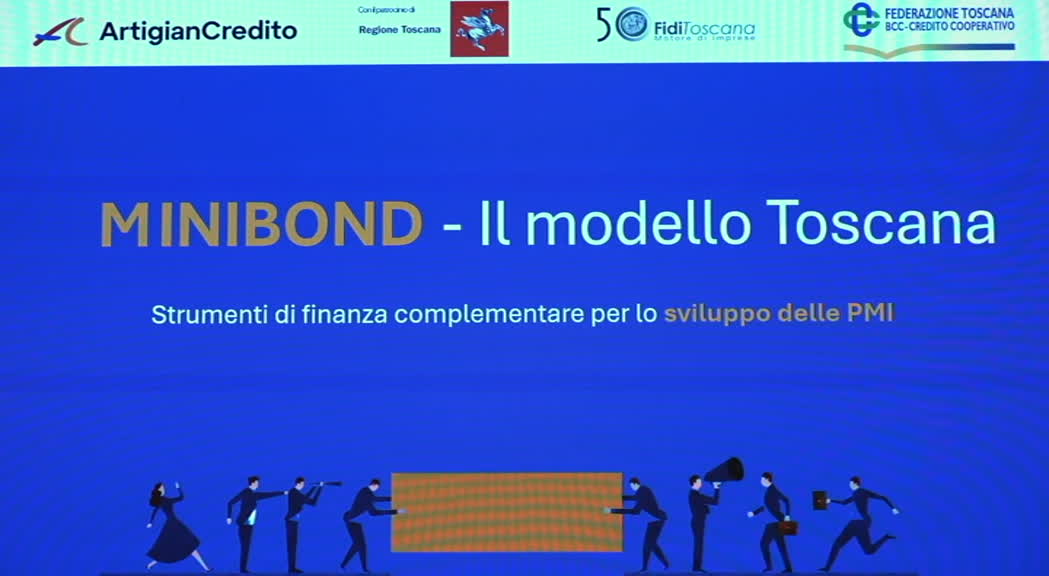 Sala della Camera di Commercio di Firenze con pubblico riunito per discussione su finanziamenti alle imprese