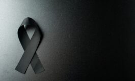 top view black bow as mourning symbol dark wall 1 265x160