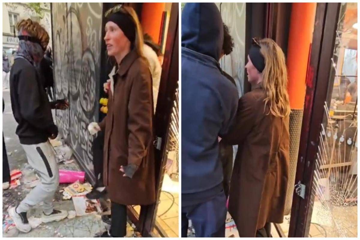 Parigi, donna prova a fermare i saccheggiatori: "Perché lo fate?"