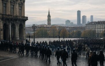 Polizia a Torino: lacrimogeni e cariche contro manifestanti anti-riarmo