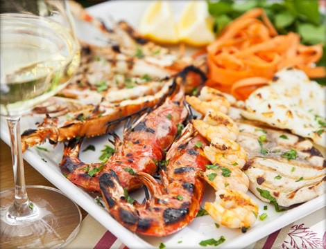 Sconti Milano per una cena per due persone con 1 kg di grigliata di pesce