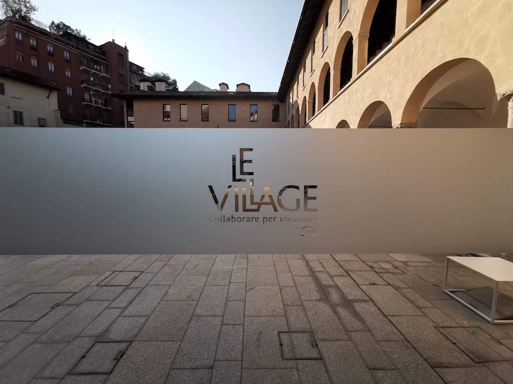le village by ca milano bilancio